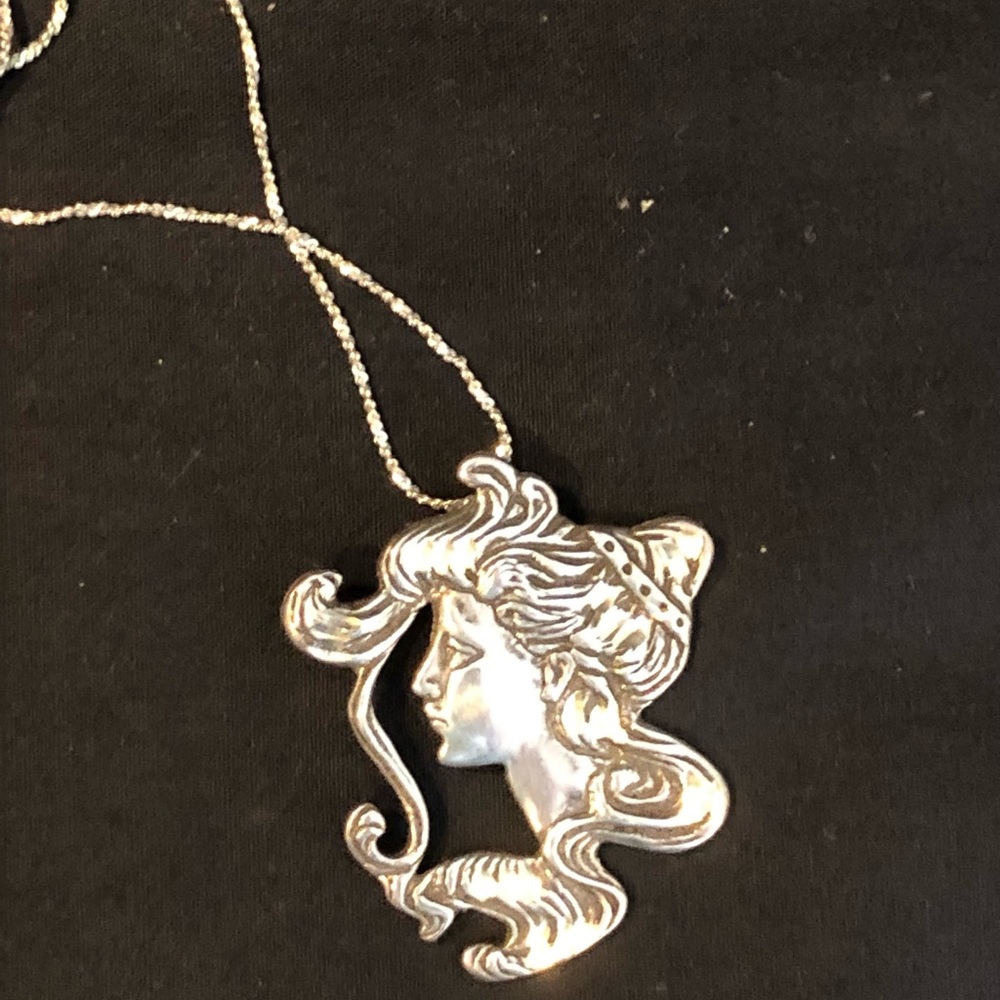 Goddess/woman’s head on chain